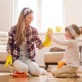 Mother and daughter cleaning day